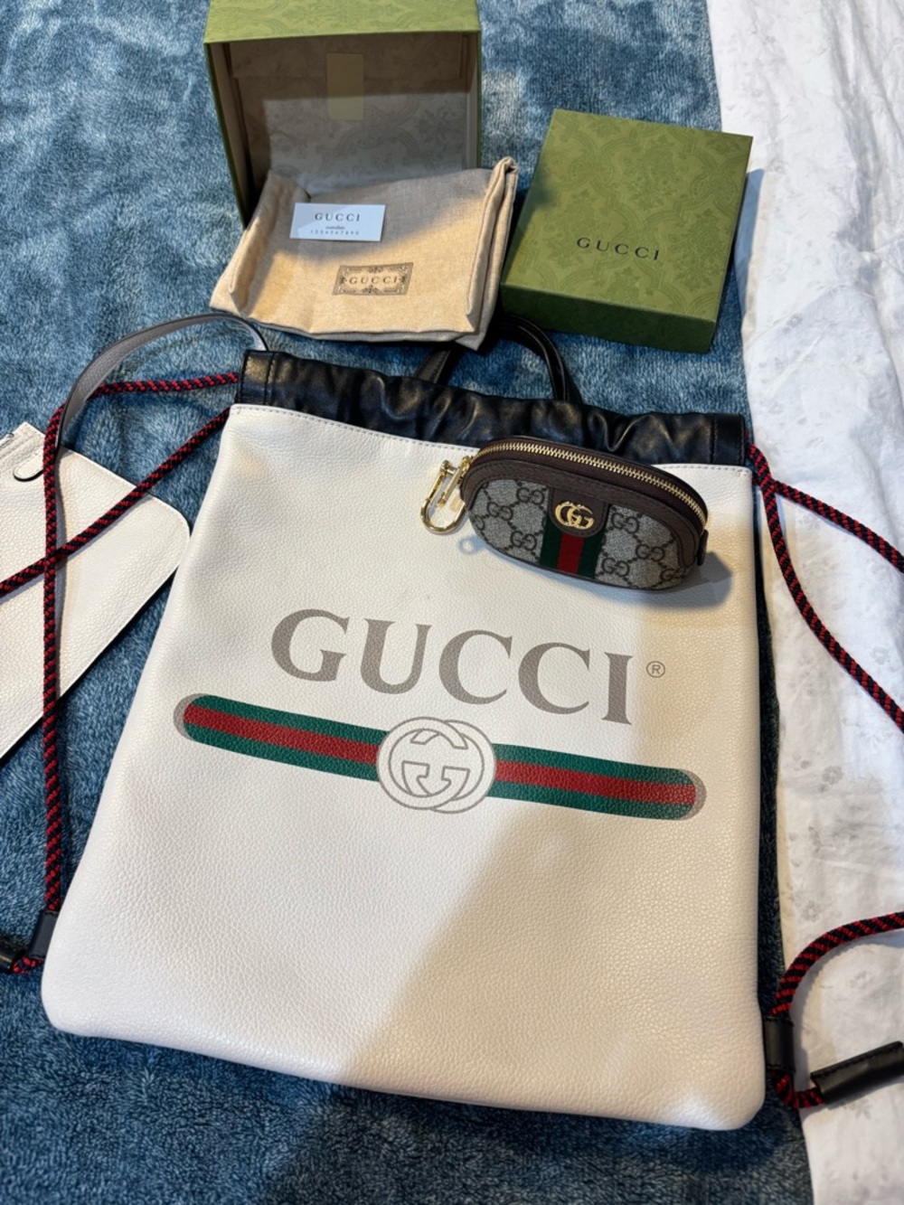 Gucci White Logo Drawstring Backpack with GG Key Pouch
